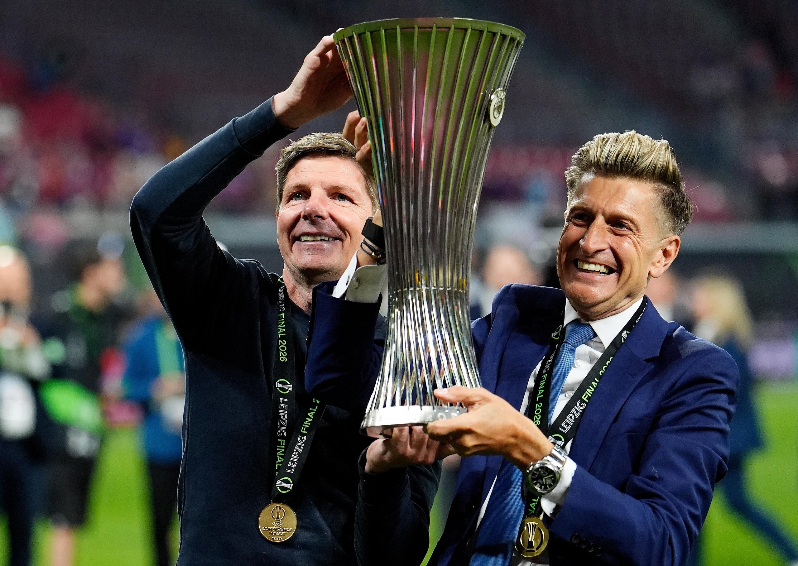 Crystal Palace manager Oliver Glasner and chairman Steve Parish (right) celebrate with the UEFA Europa Conference League trophy.