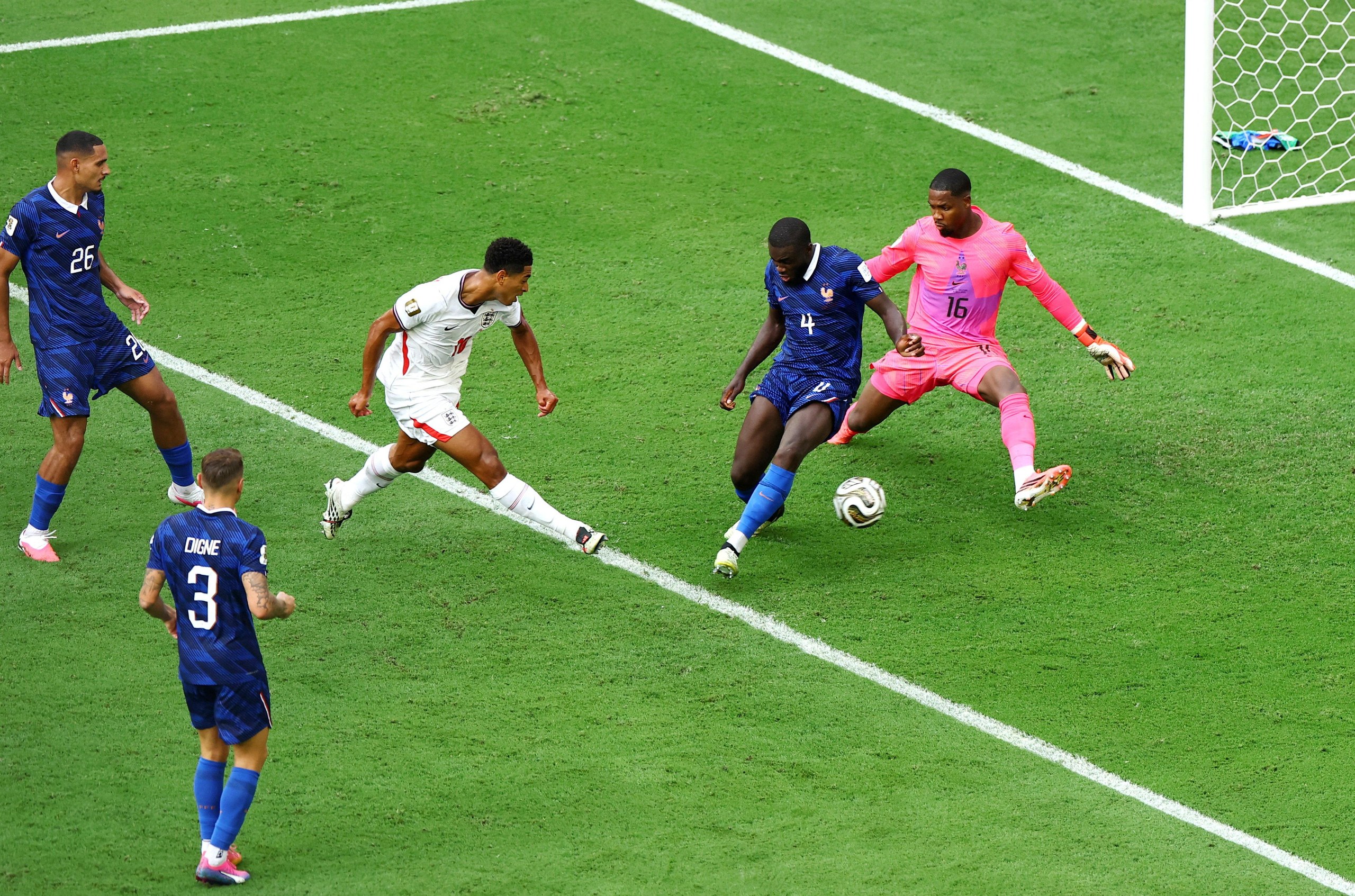 Jude Bellingham scores past Mike Maignan and Dayot Upamecano