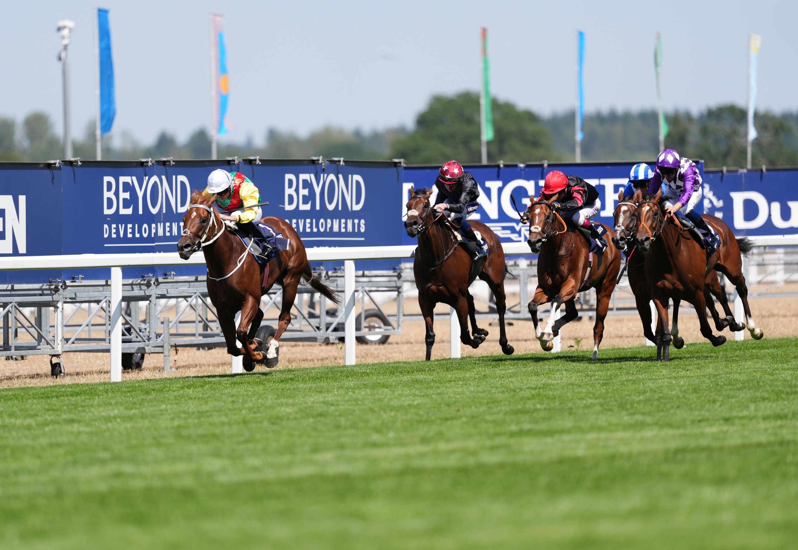 Jockey Ryan Moore on Kon Tiki (left) on their way to winning the Longines Valiant Stakes.