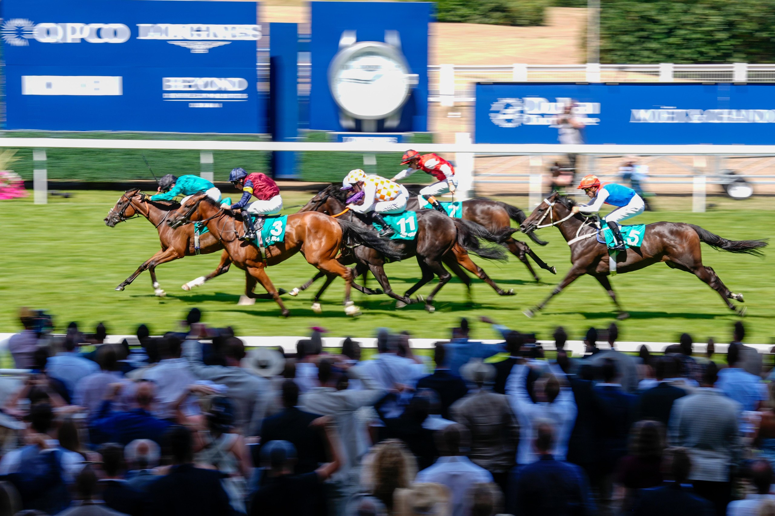 Oisin Murphy riding Moonrise (left), turquiose) wins The Princess Margaret Japan Cup Stakes at Ascot Racecourse.