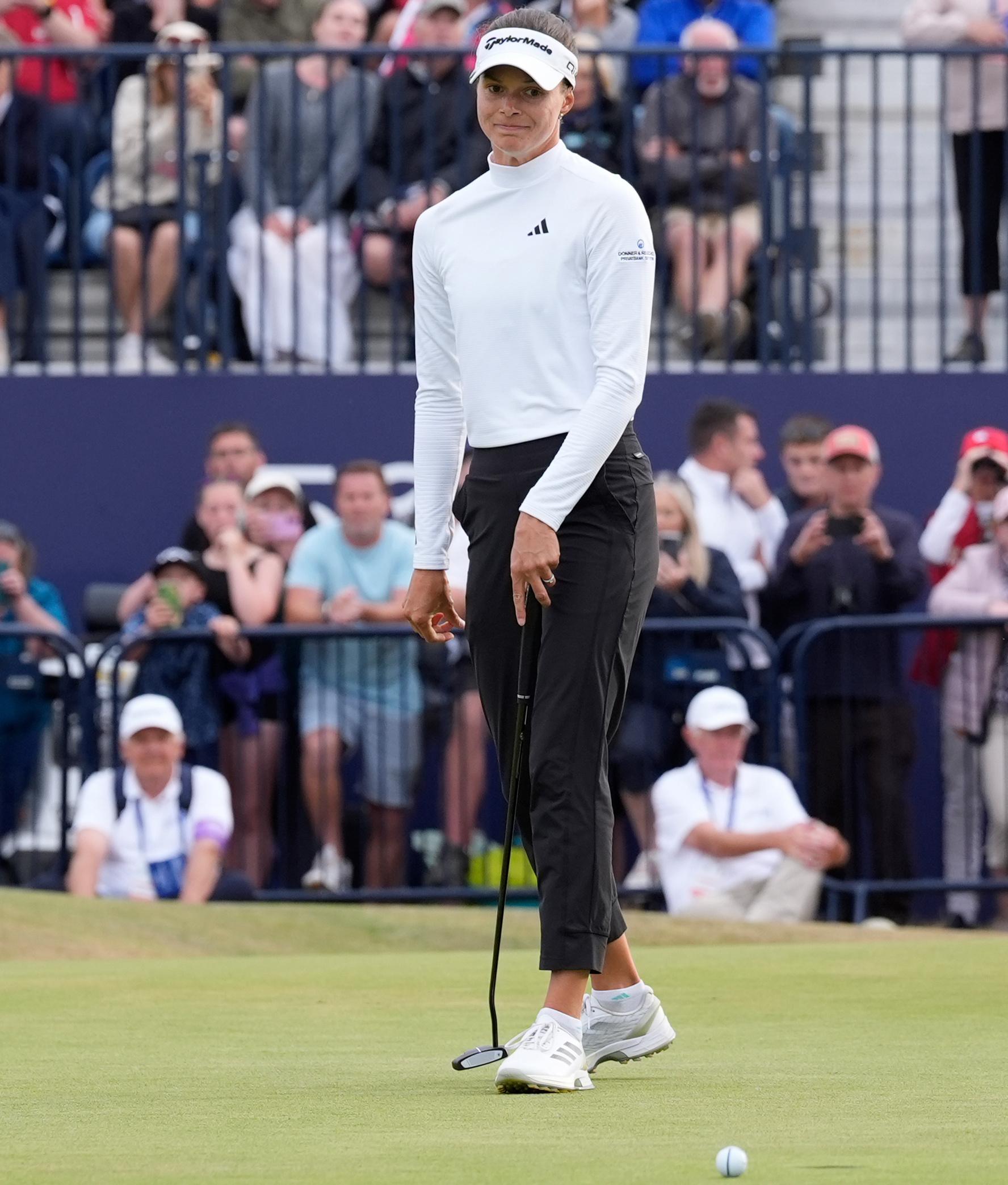 Esther Henseleit of Germany misses the put on the 18th green to win the playoff
