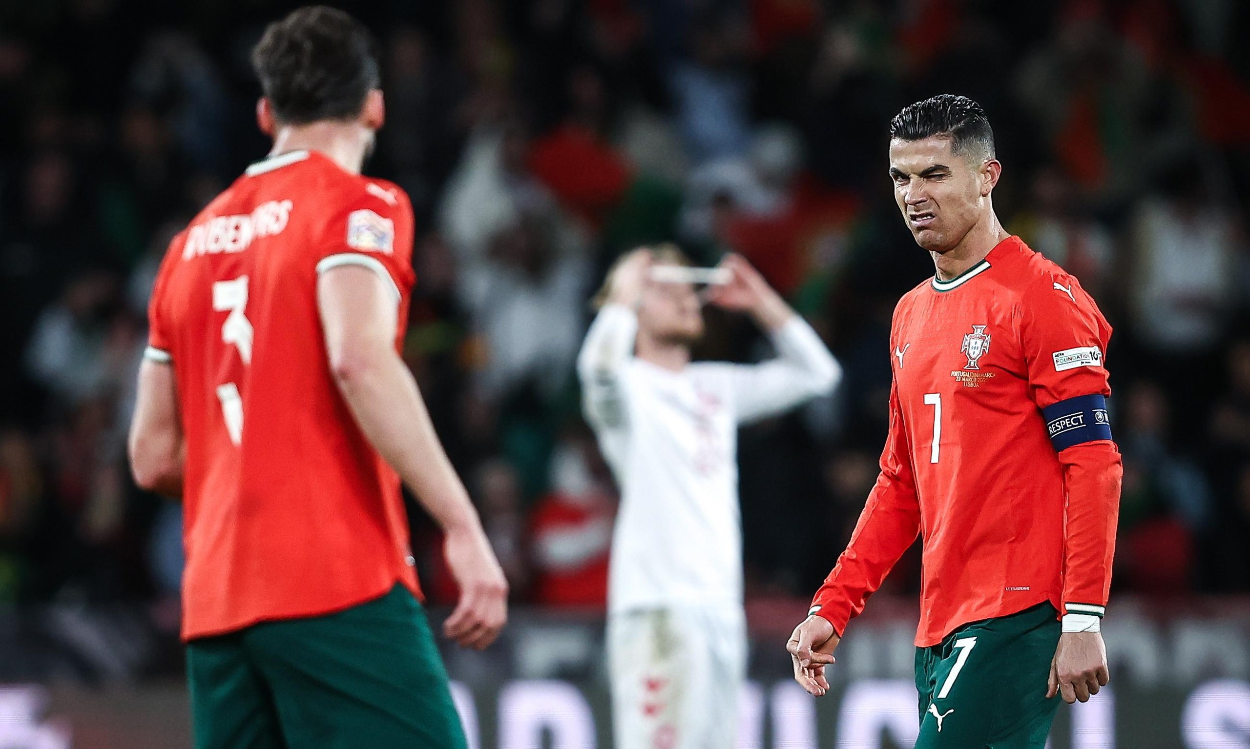 Portugal's Cristiano Ronaldo (R) celebrates scoring a goal