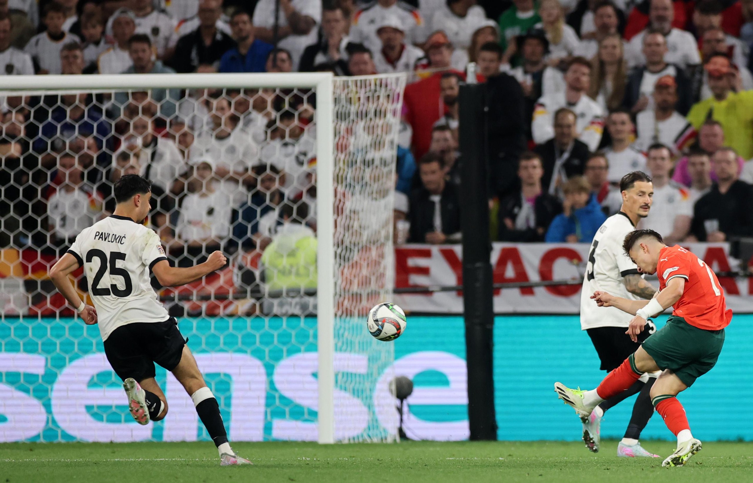 Francisco Conceicao of Portugal scores his team’s equaliser in the Nations League semi-final against Germany.