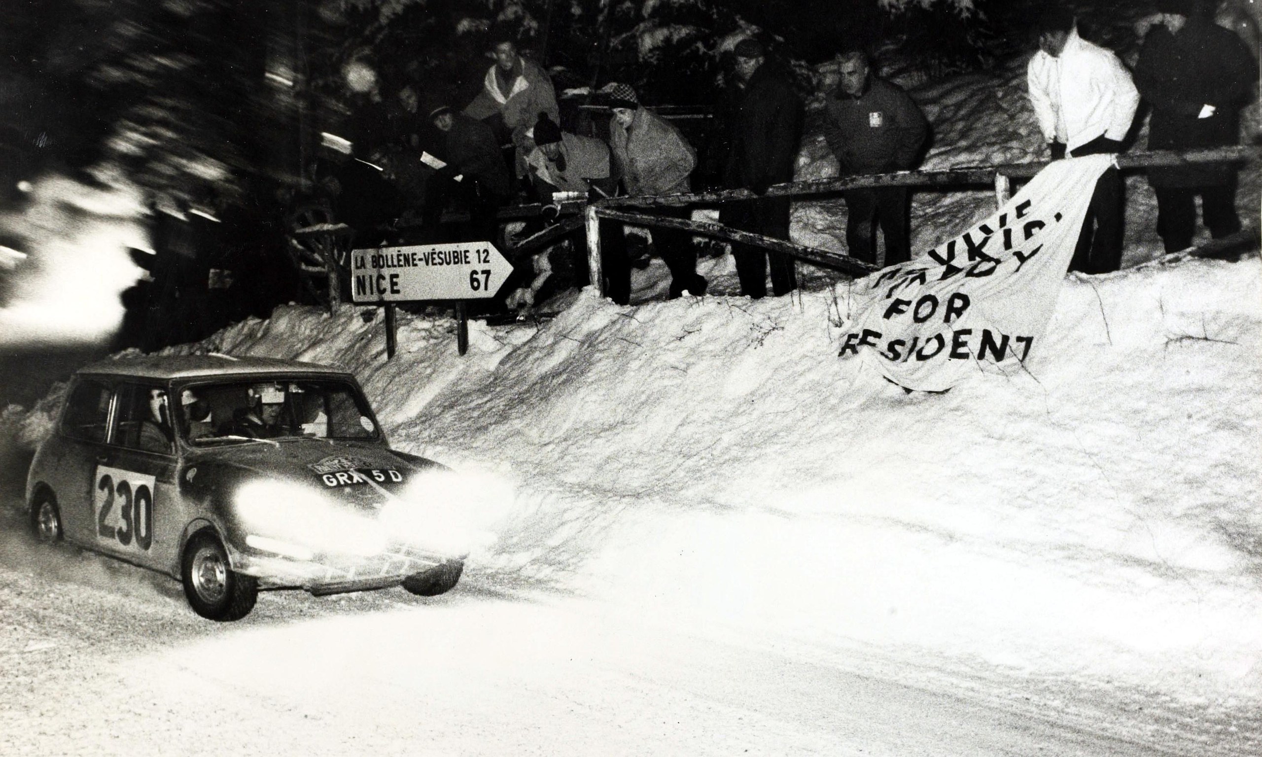 Paddy Hopkirk and Henry Liddon nearing the end of the 1966 Monte Carlo rally in snowy conditions. They came third but were disqualified on a technicality over the kind of headlight bulbs they used.
