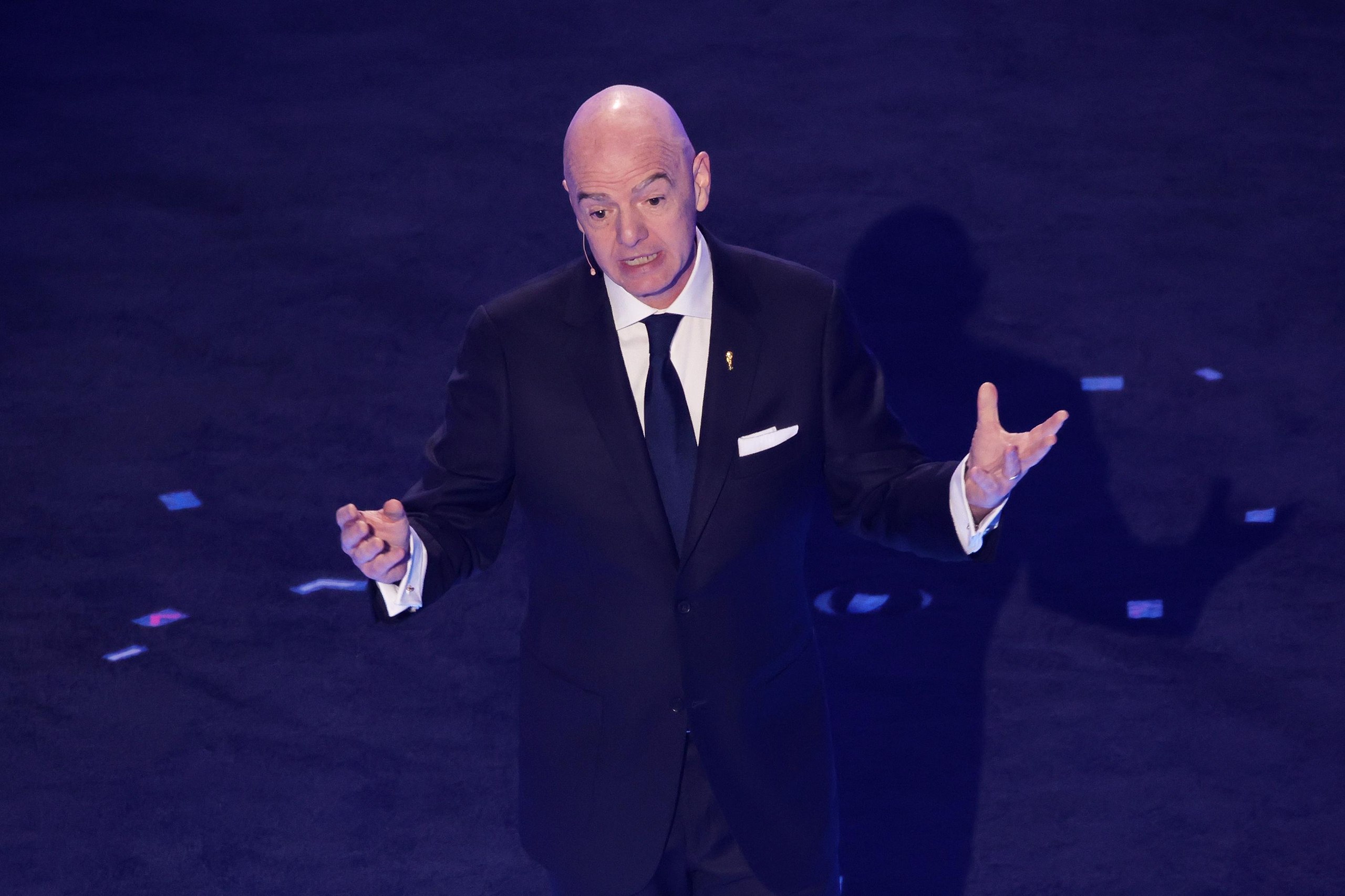 Gianni Infantino gesturing with arms spread wide