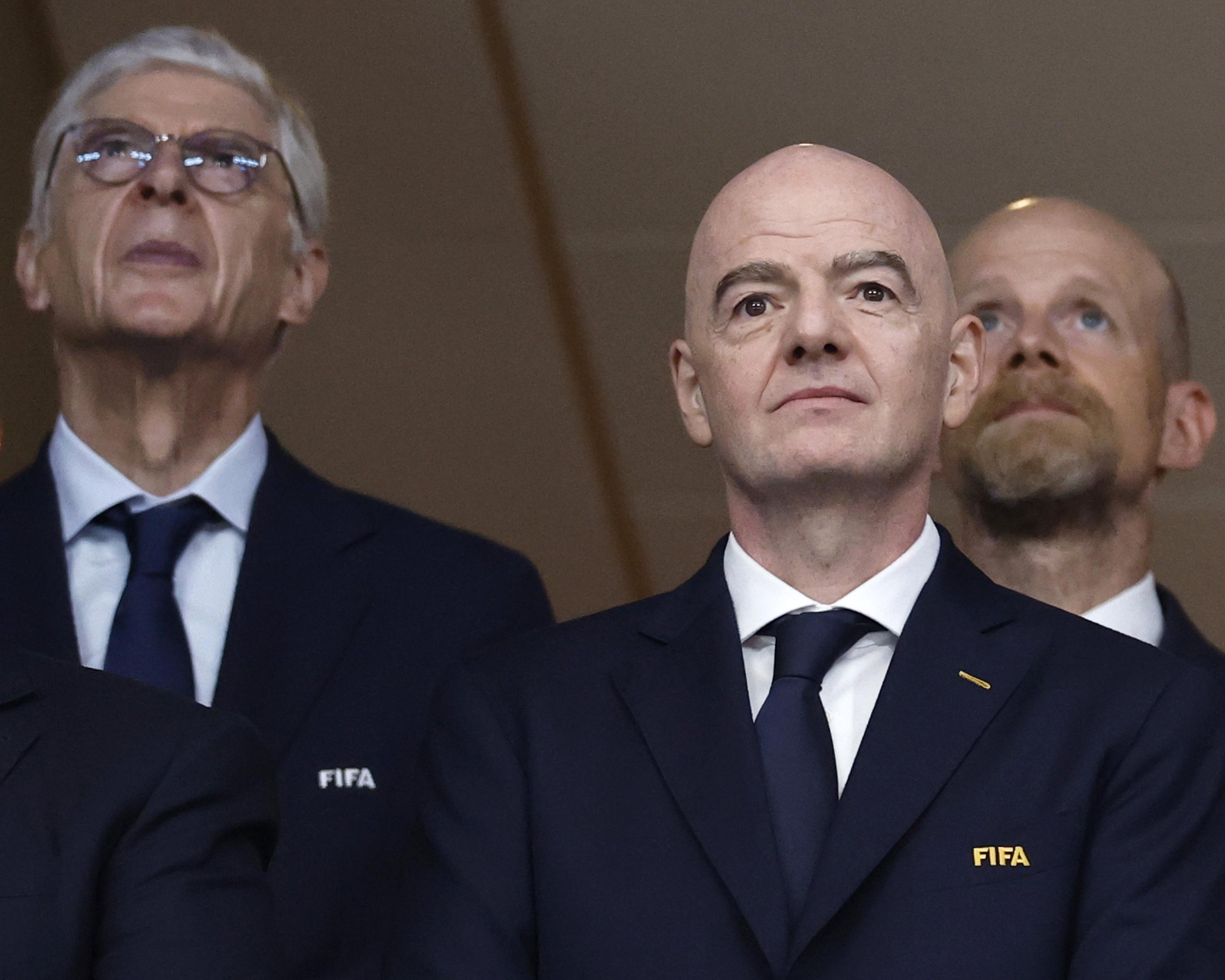 The Fifa president, Gianni Infantino (centre), and secretary general ,Mattias Grafström (right), with Arsène Wenger during the during the 2026 World Cup