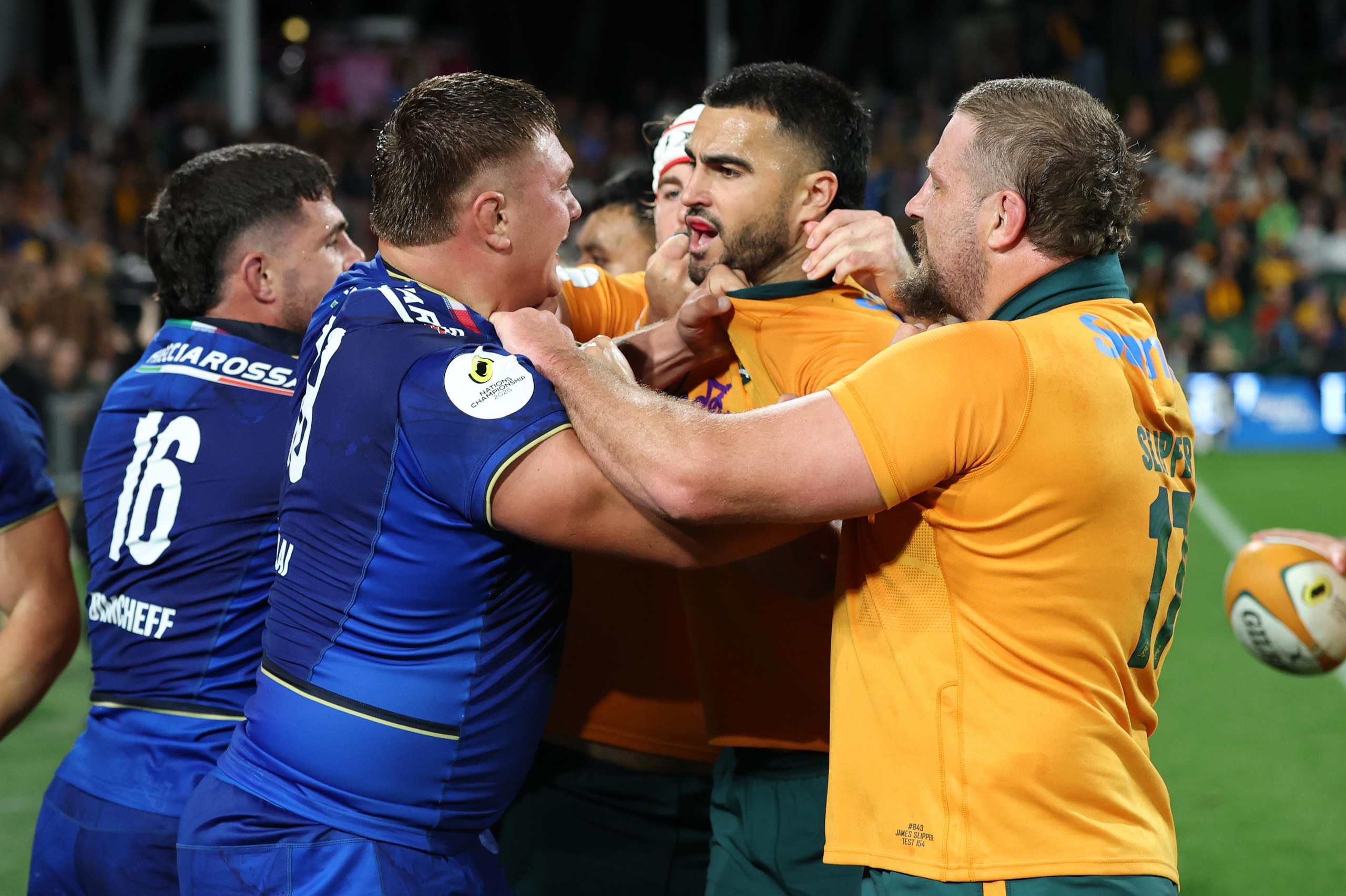 Ion Neculai and Tom Wright lock horns during the Nations Championship match between the Wallabies and Italy
