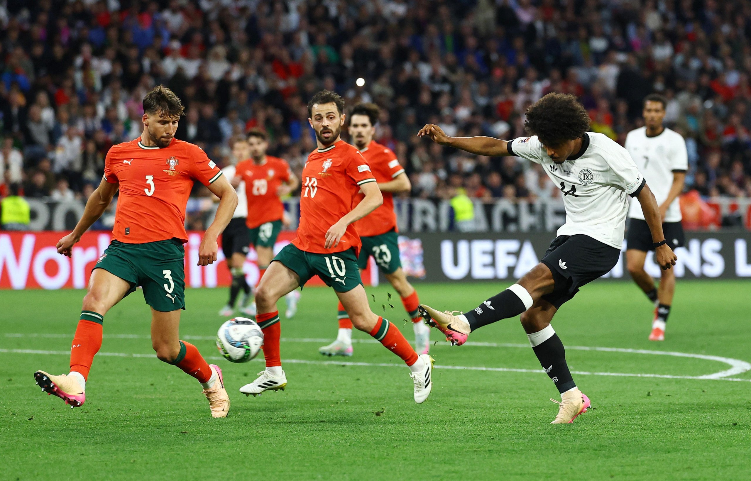 Germany's Karim Adeyemi shoots at goal.