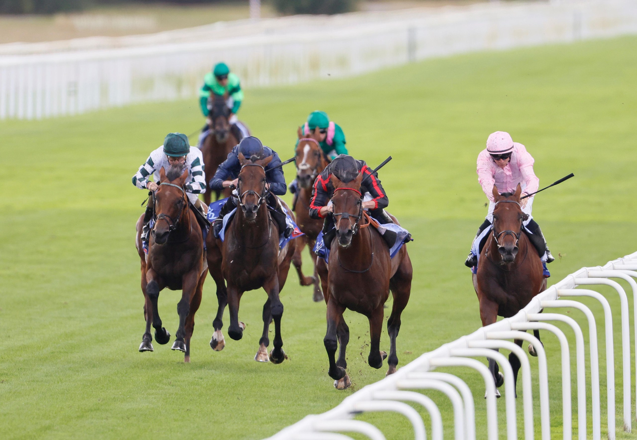Maltese Cross, ridden by Tom Marquand, (second right) powers down the straight on their to winning the Great Voltigeur Stakes.