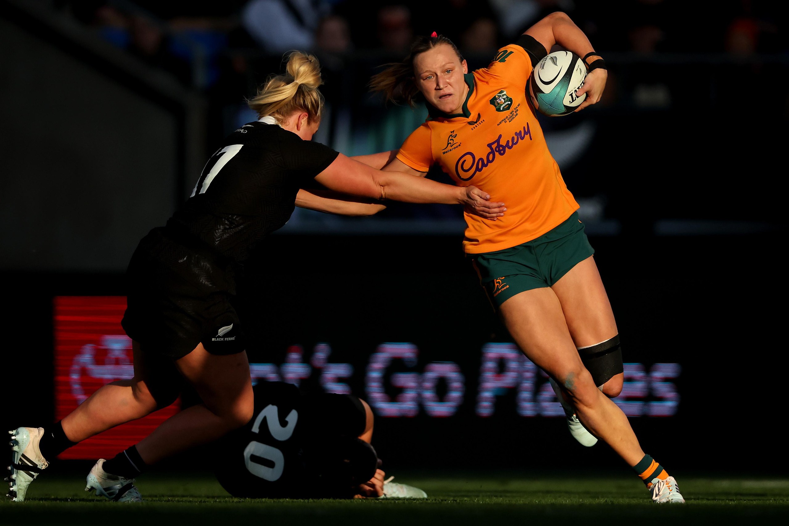 Australia’s rugby sevens star Maddison Levi runs the ball during her Wallaroos debut against New Zealand