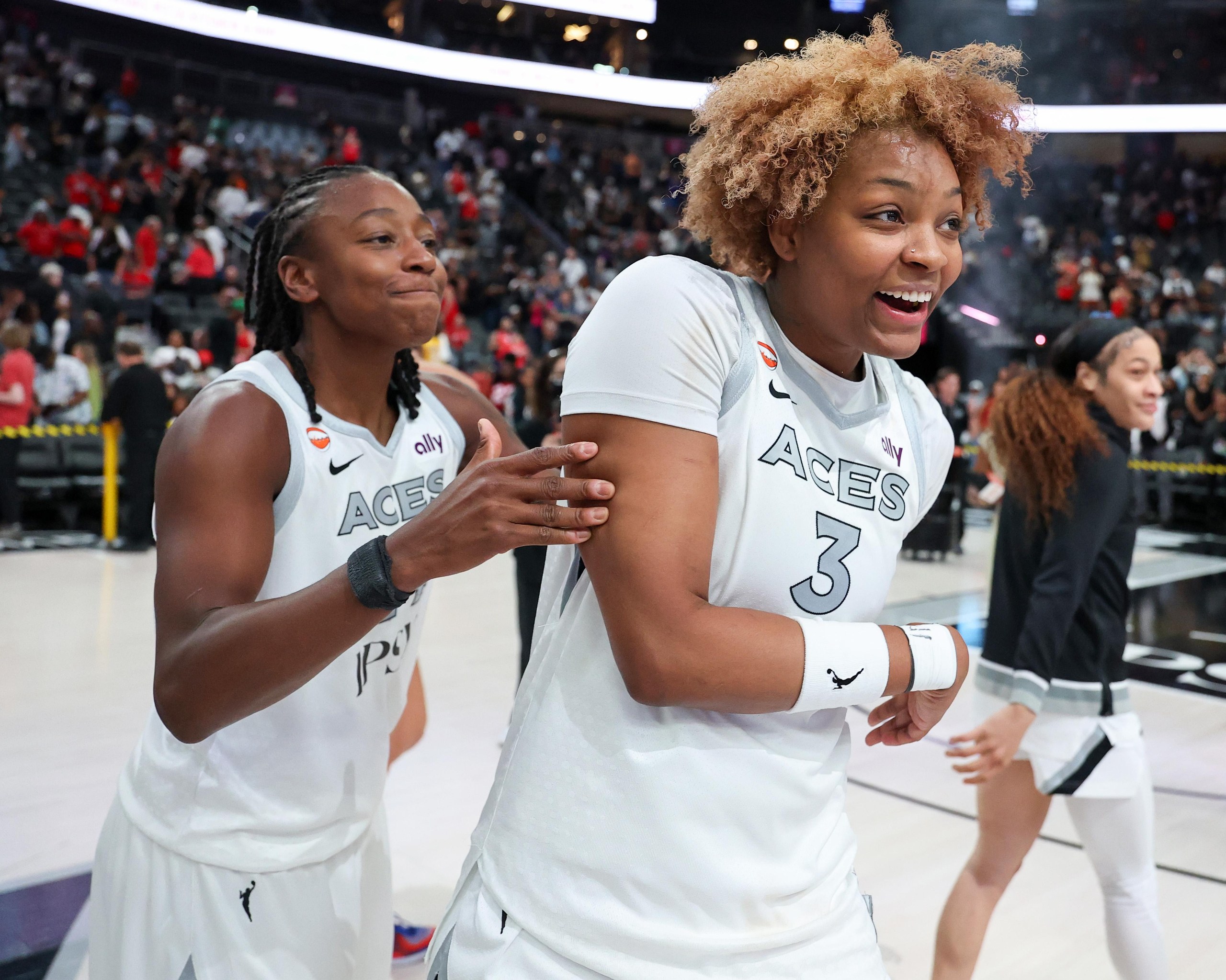 Two women in white jerseys