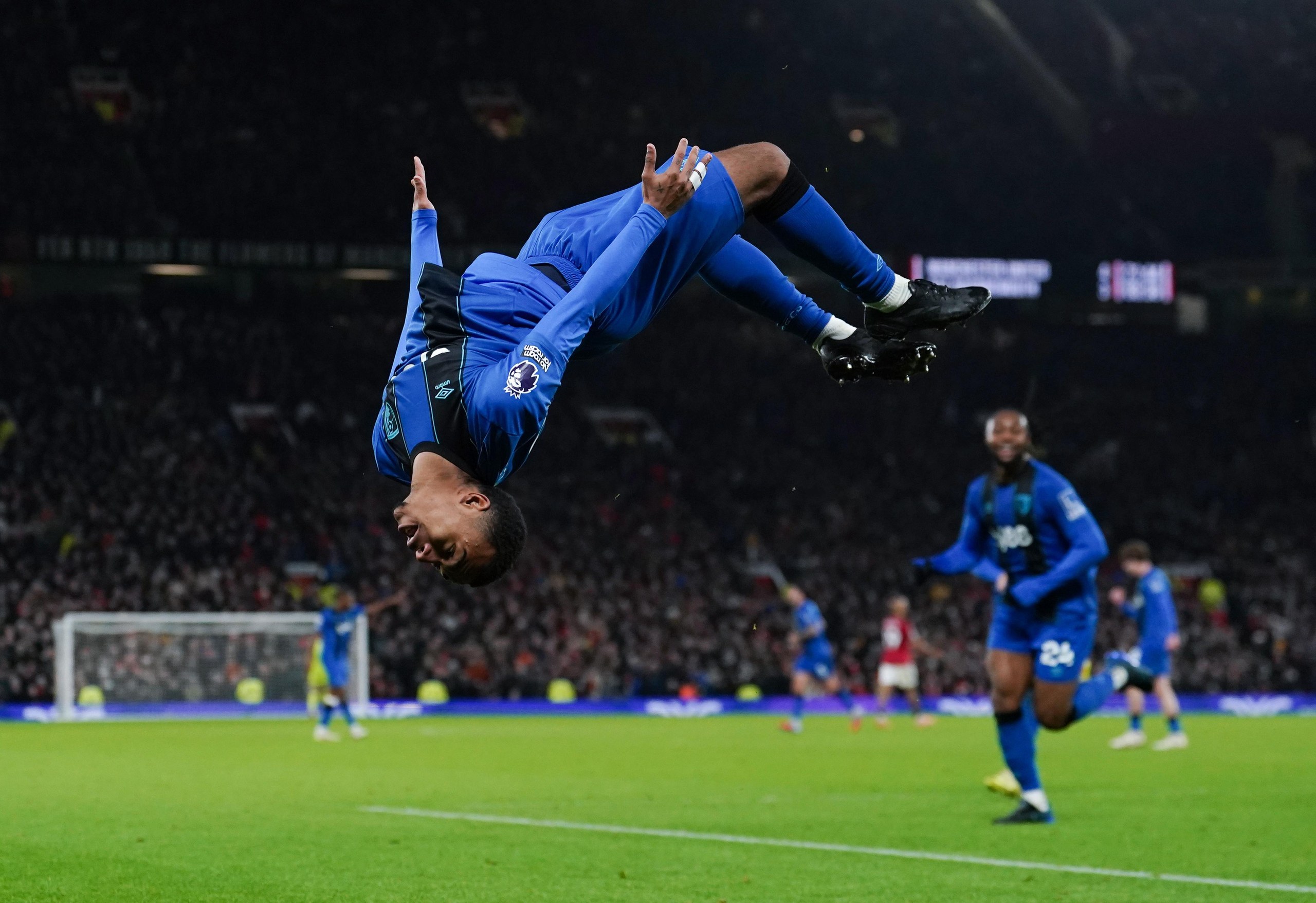 Eli Junior Kroupi celebrates scoring at Old Trafford in December