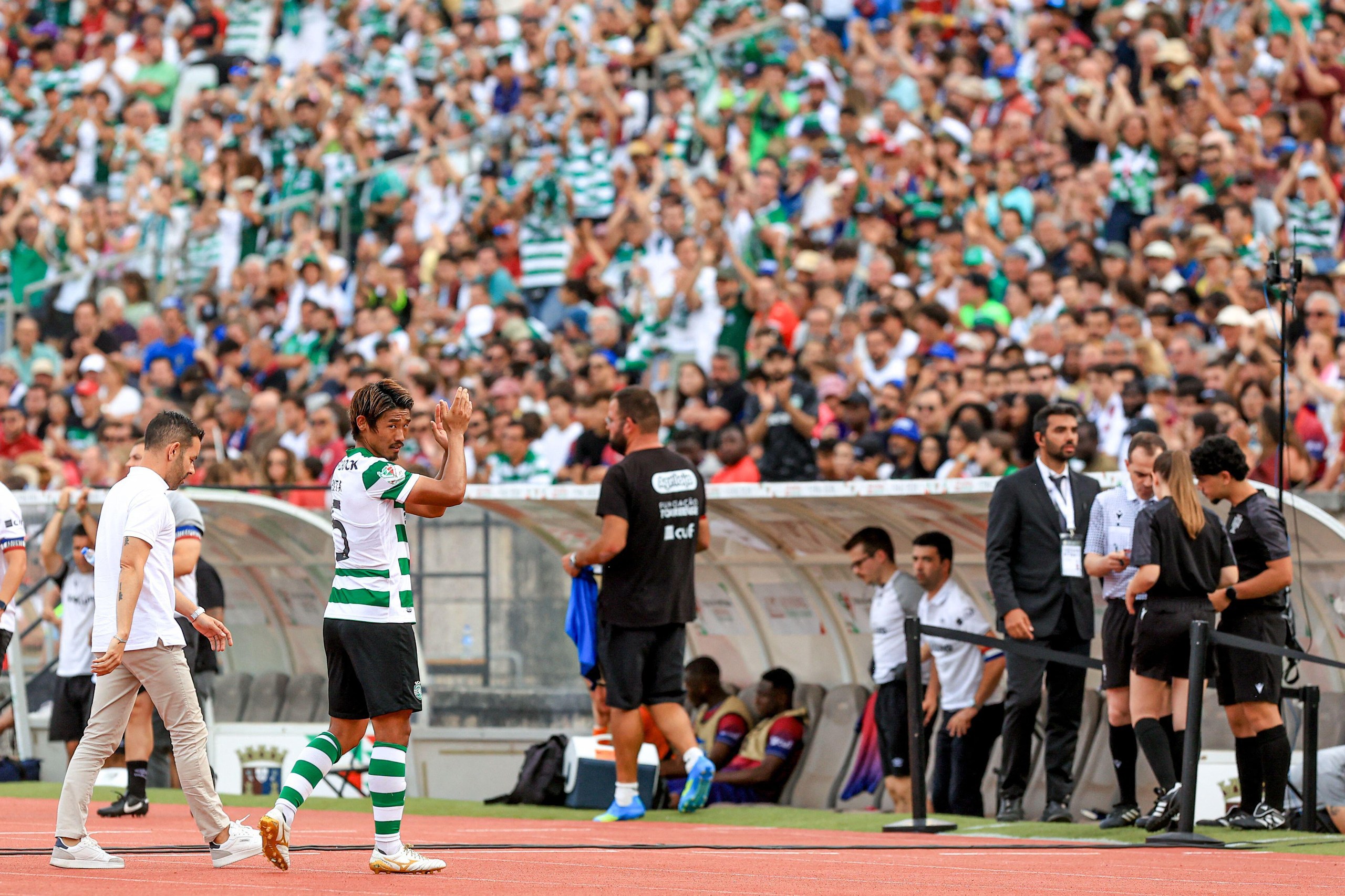 Hidemasa Morita applauds the Sporting fans during the Portuguese Cup final in May