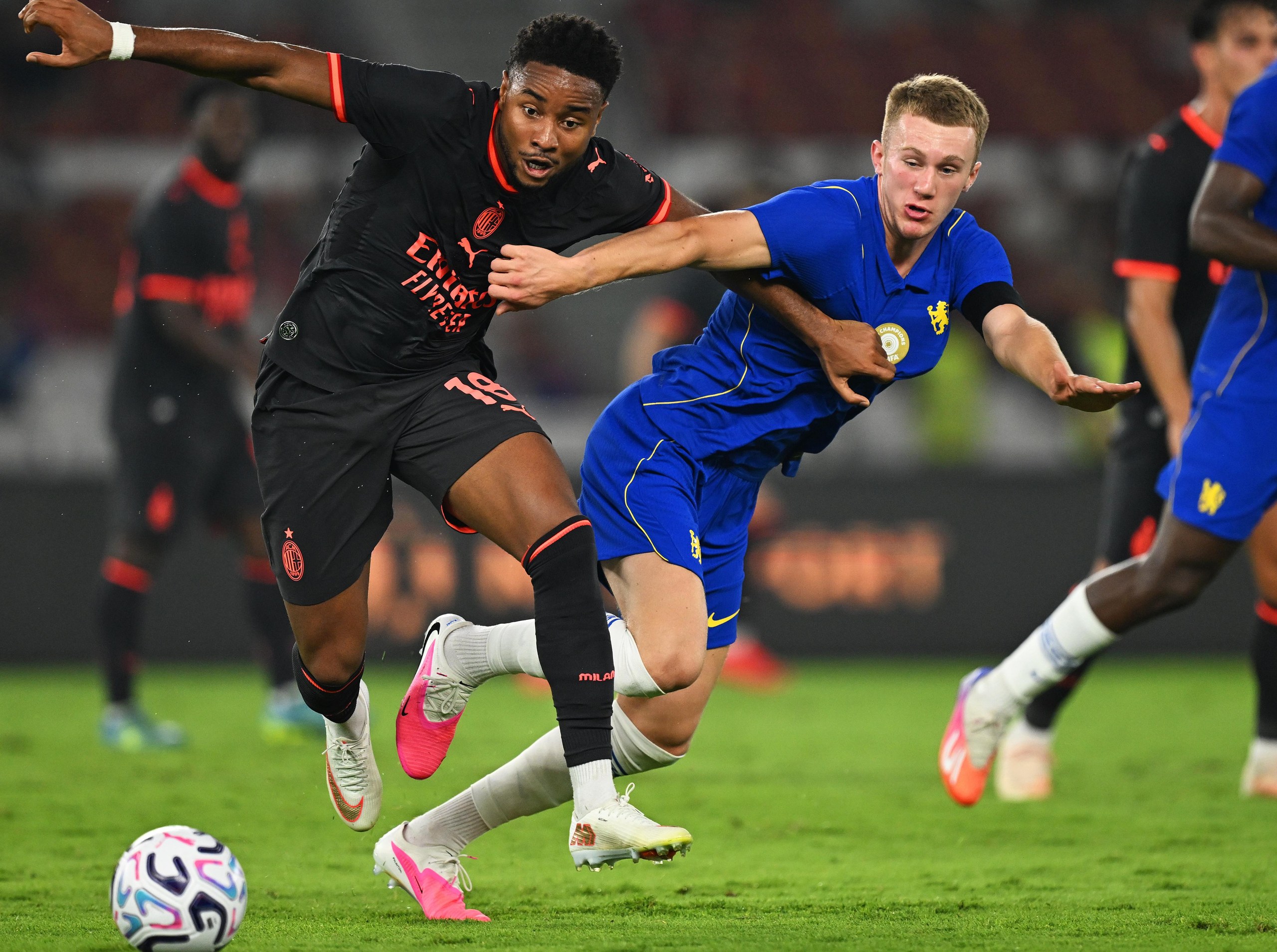 Reggie Watson (right) in pre-season action for Chelsea.