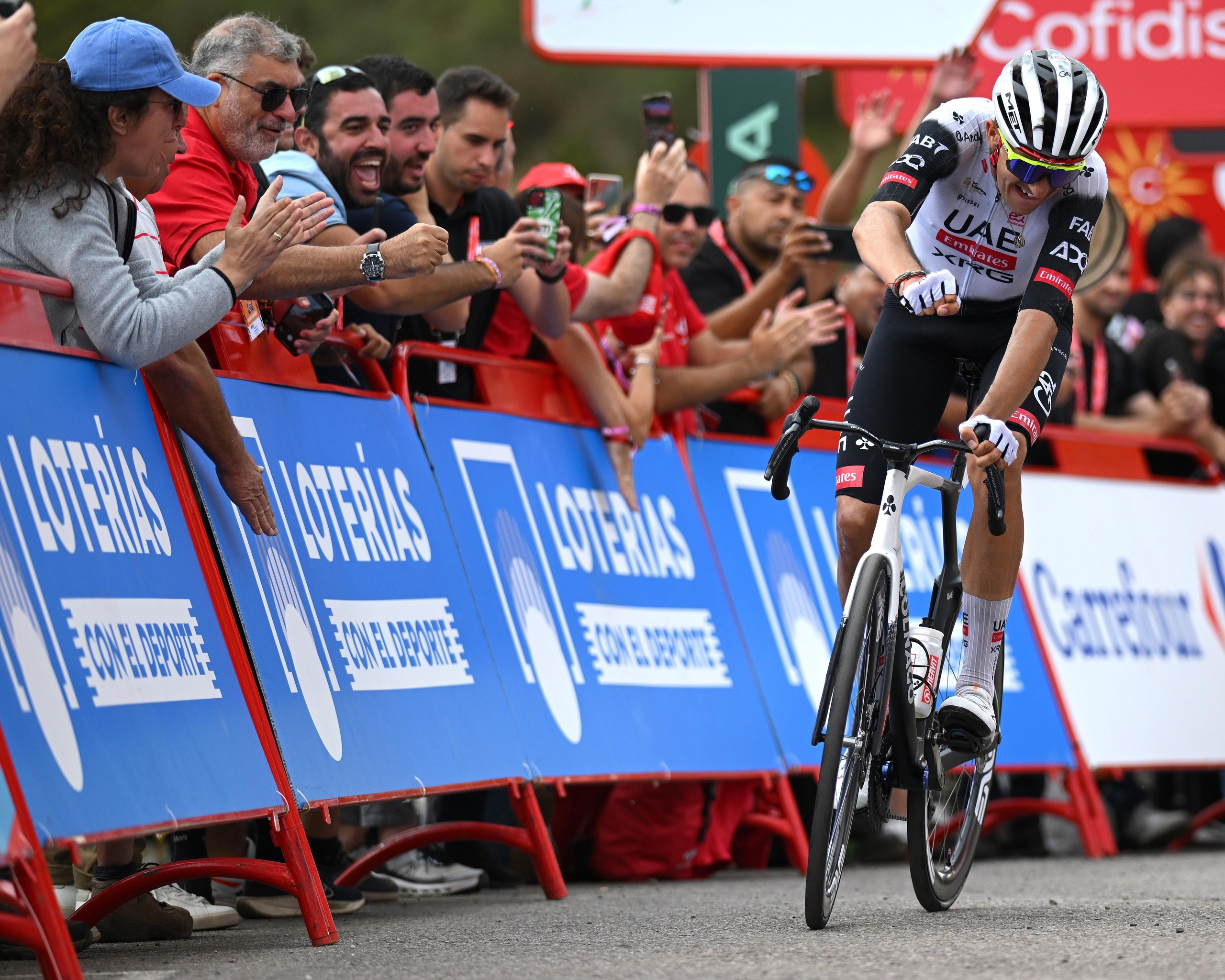 Marc Soler races clear to win stage 14 of the Vuelta.