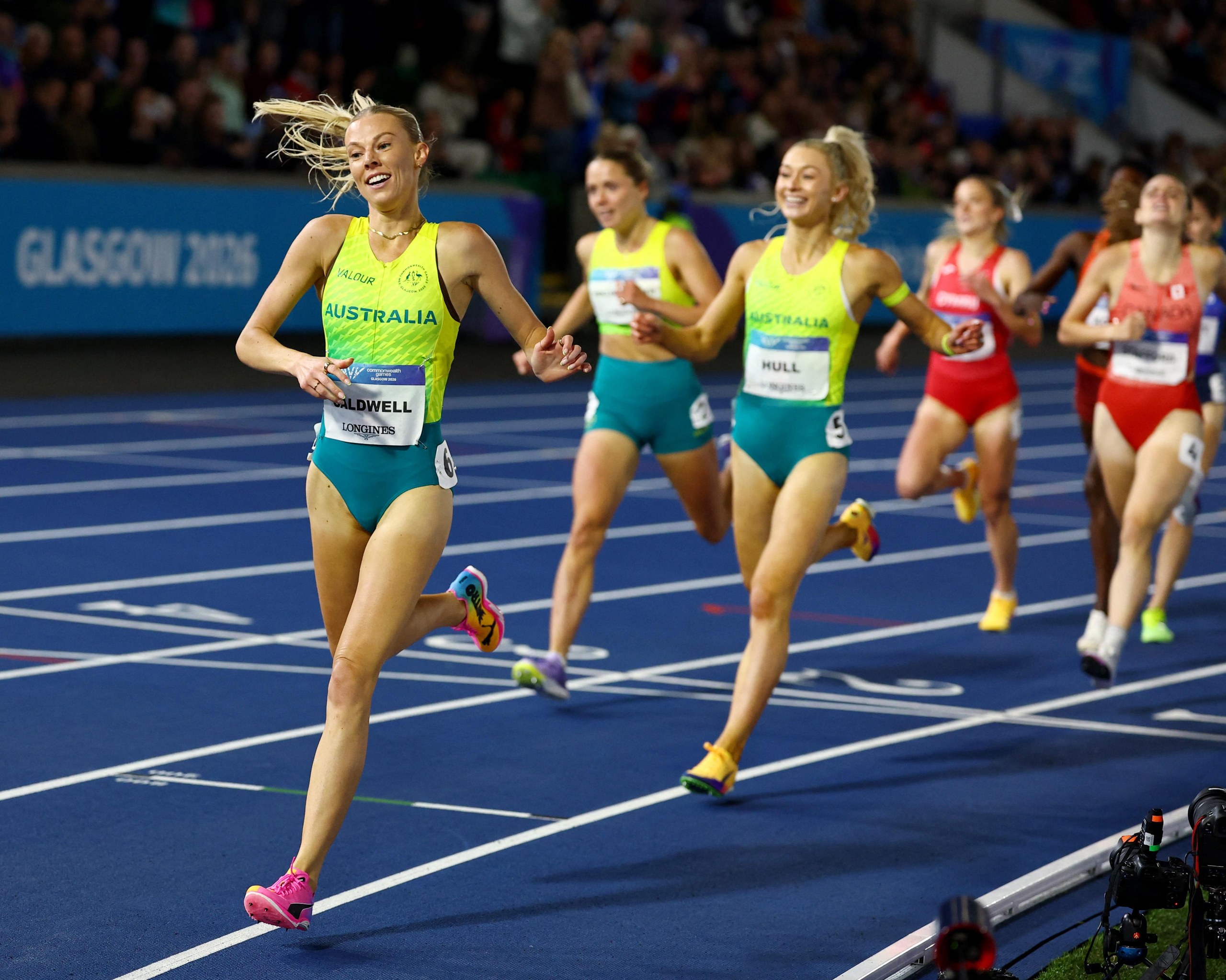 Caldwell celebrates after winning the Women's One Mile Final.