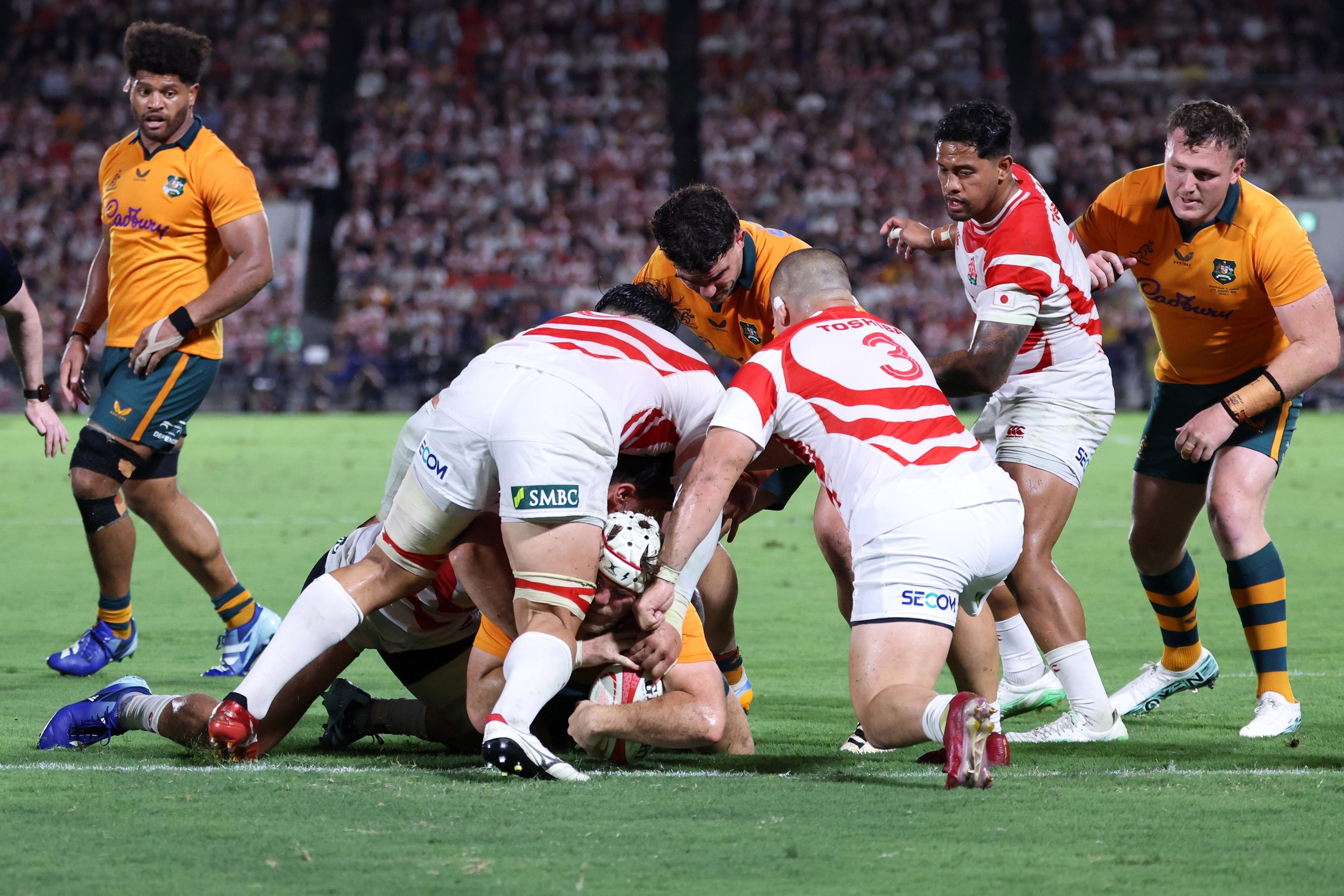 Fraser McReight scores a try for Australia against Japan