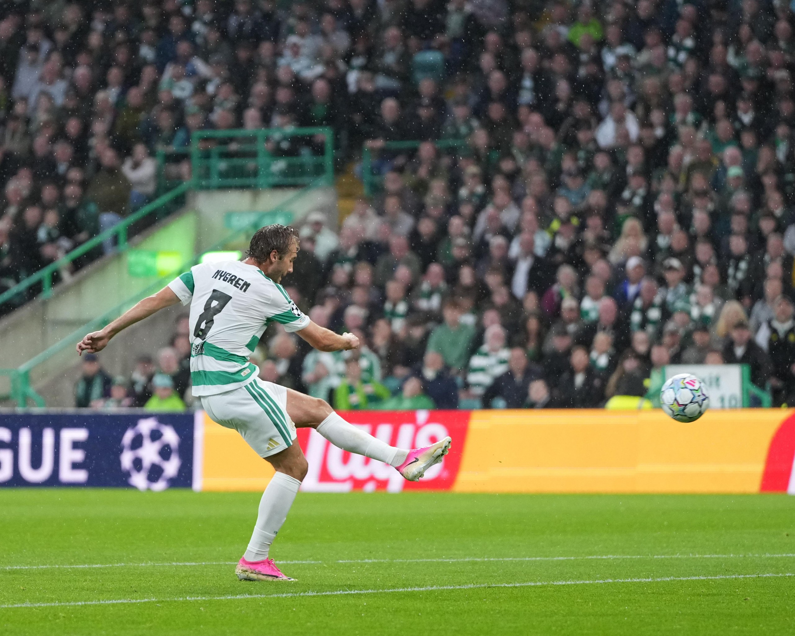 Footballer Benjamin Nygren shoots at goal for Celtic
