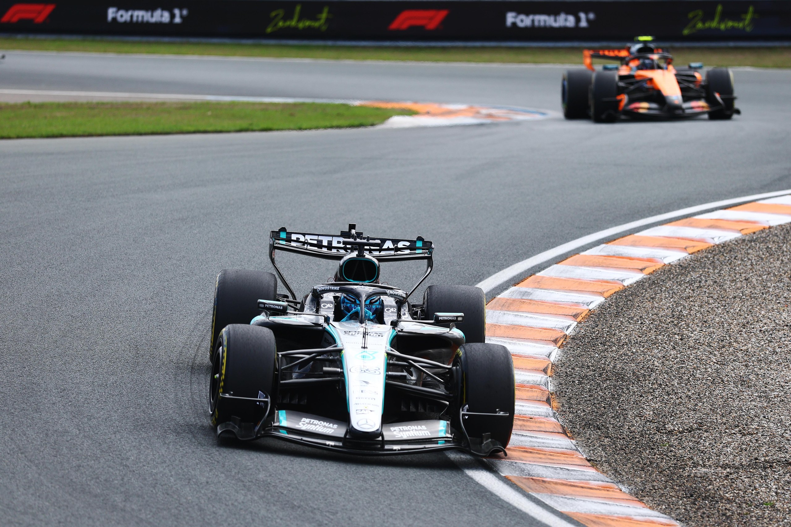 George Russell leads Lando Norris in the sprint race.