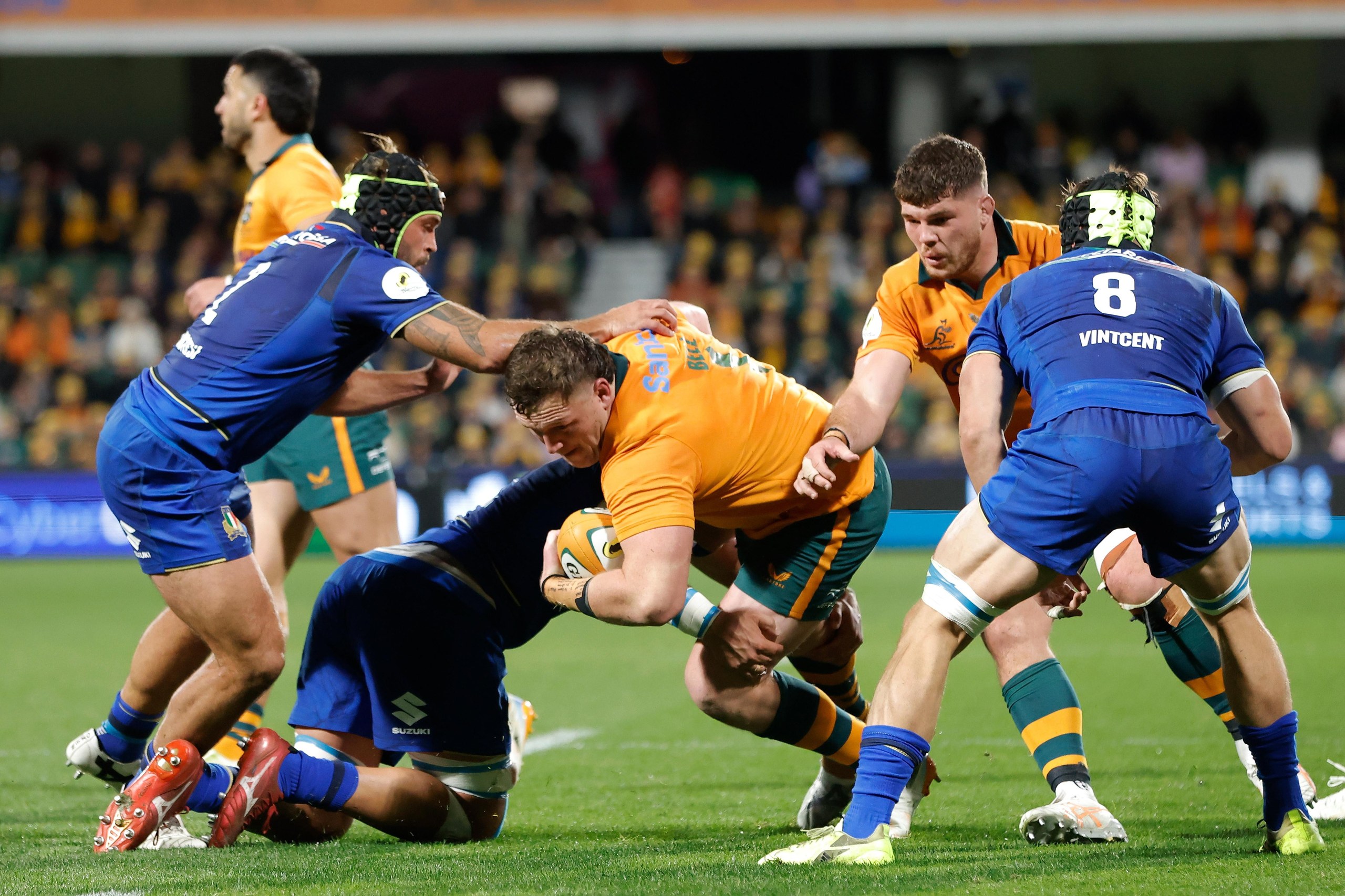 Angus Bell attacks for the Wallabies against Italy