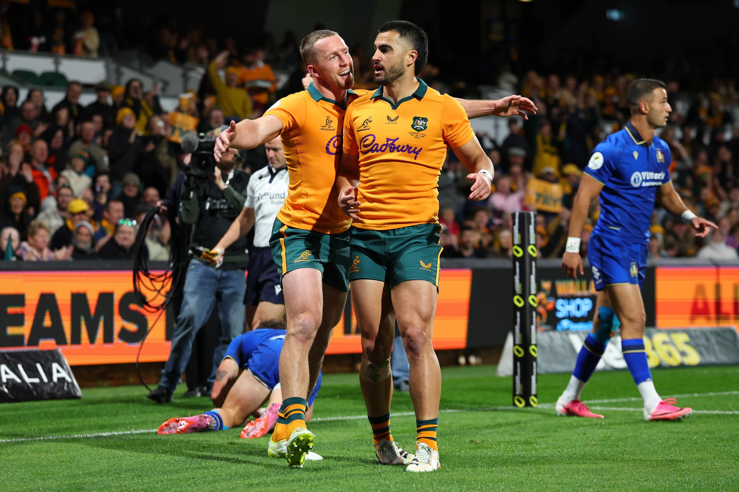 Tom Wright celebrates scoring a try for the Wallabies against Italy at HBF Park