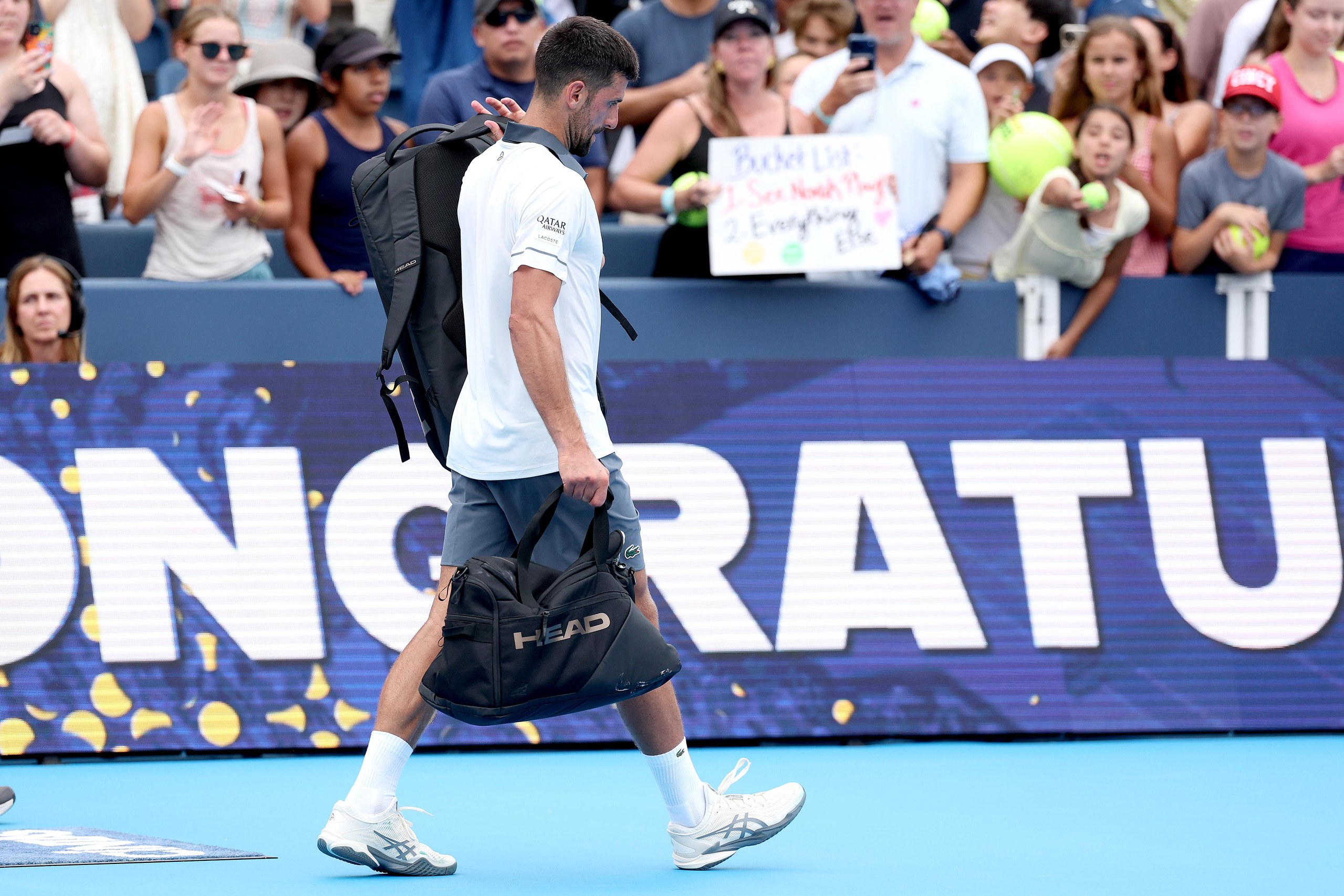 A defeated Novak Djokovic departs the court after losing 2-6, 6-4, 6-4 to Argentine Thiago Agustín Tirante