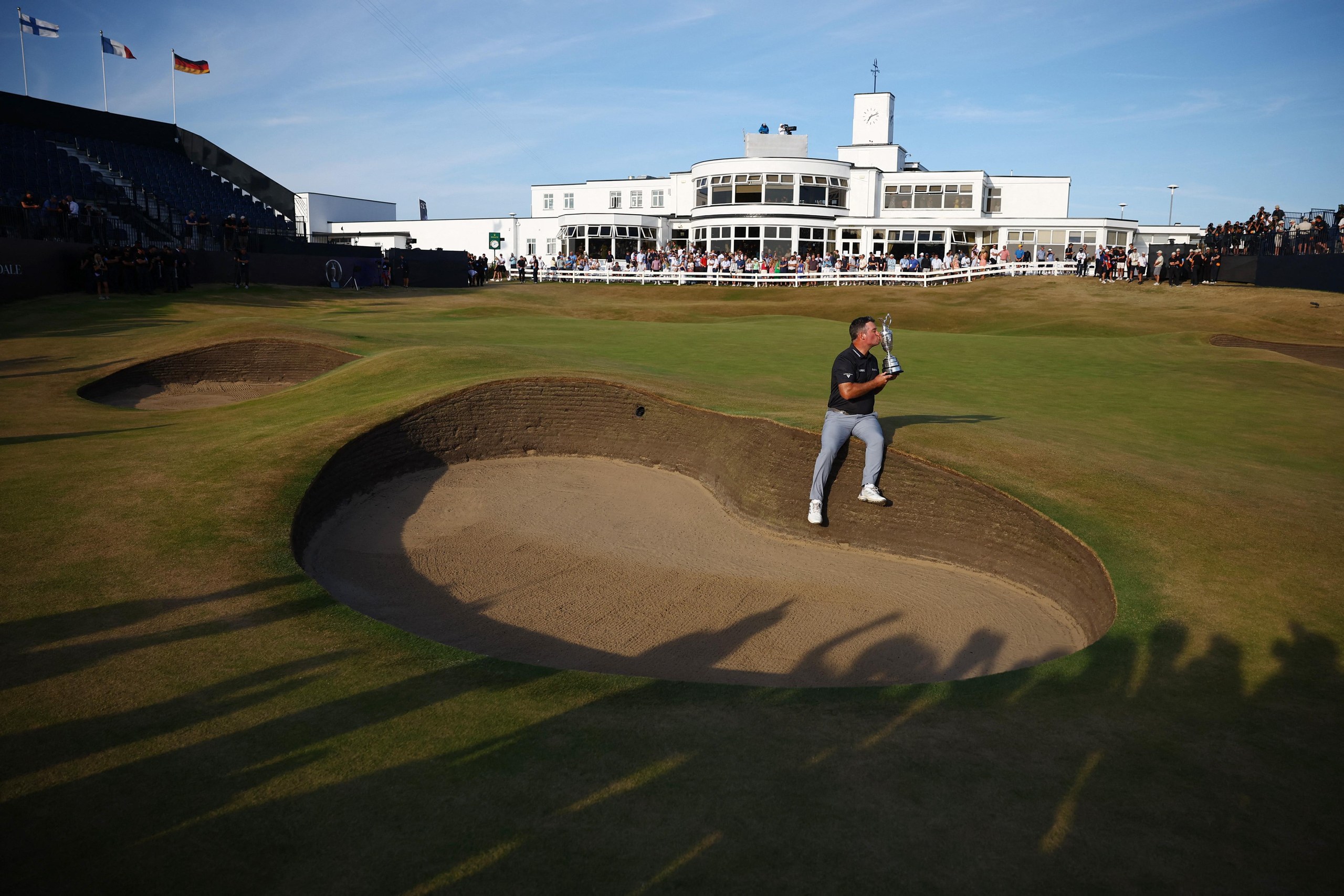 Ryan Fox kisses the Claret Jug on the 18th