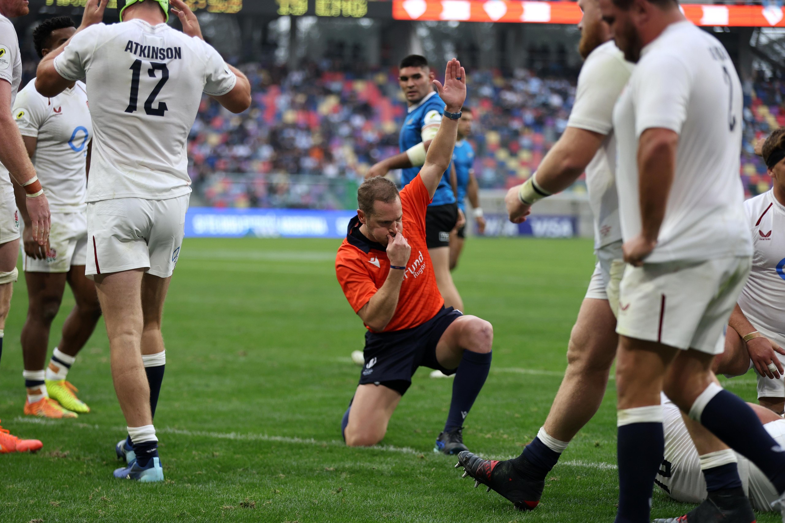Referee Angus Gardner awards Argentina their first try.