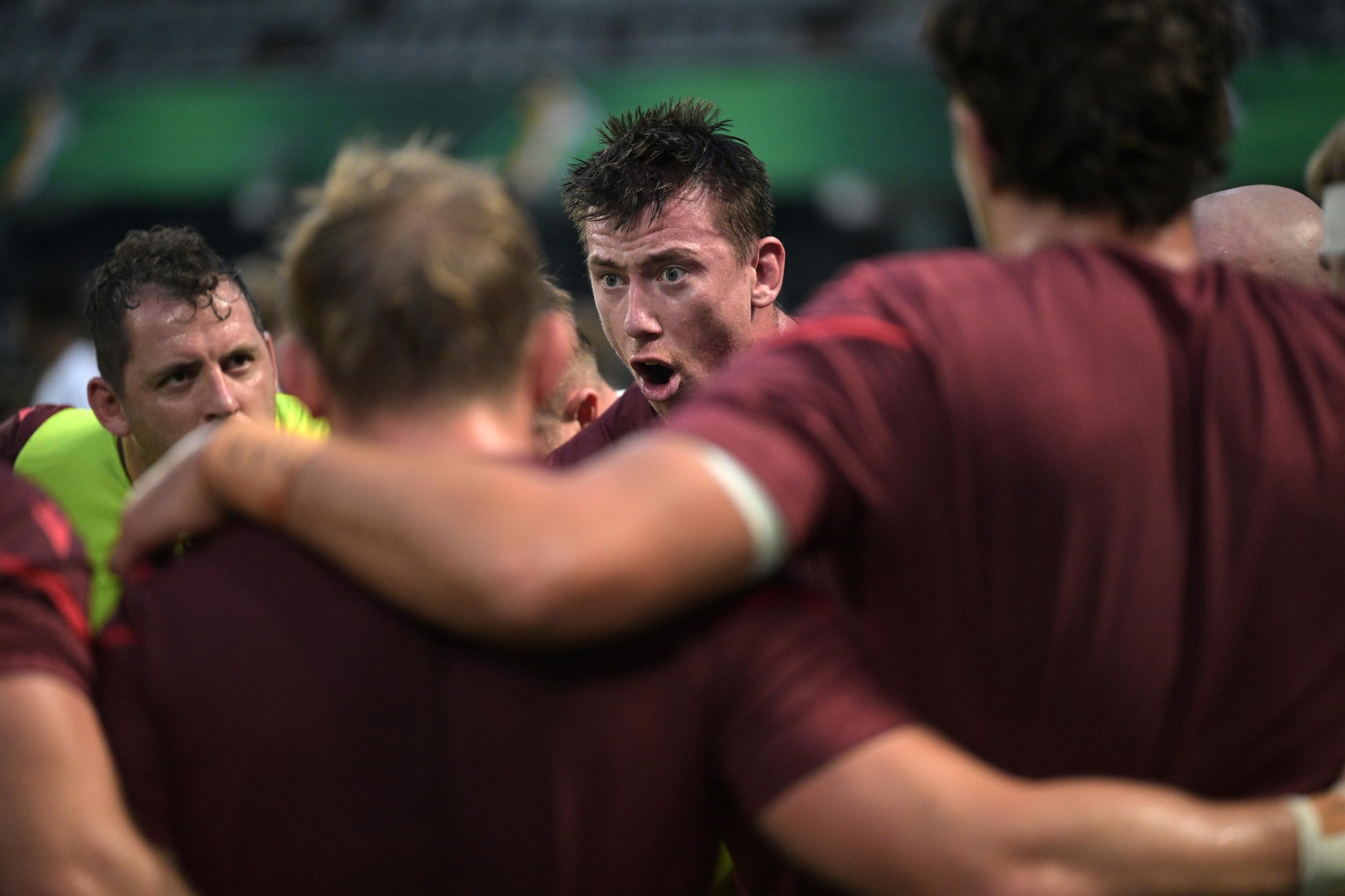 Adam Beard speaks to his Wales teammates before the start
