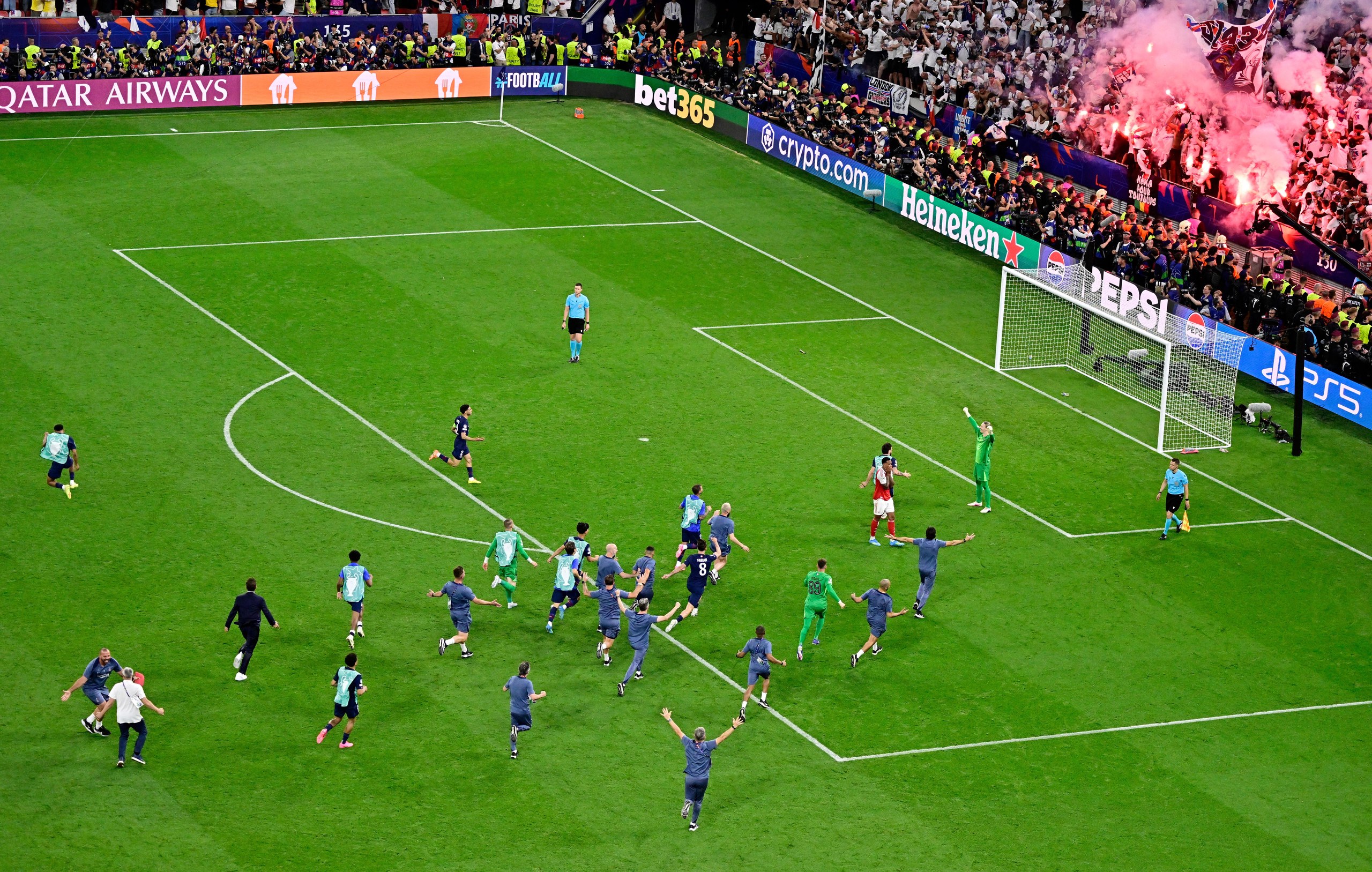 Paris St Germain players celebrate winning the Champions League.
