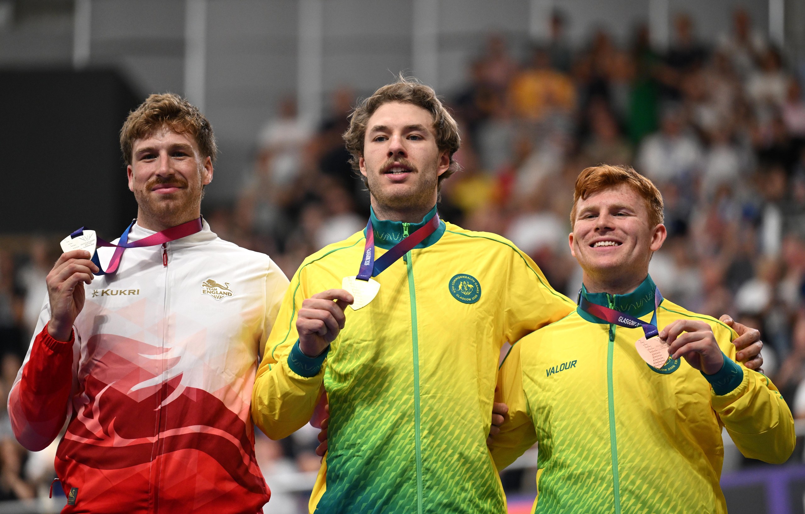England’s silver medalist Joseph Truman with Leigh Hoffman and Tayte Ryan of Australia.